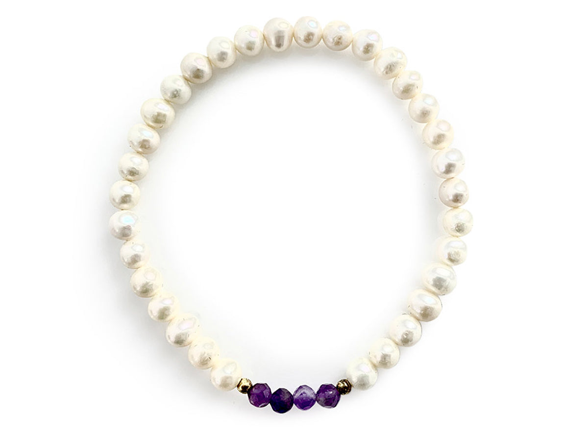 PULSERA DE PERLAS CON CENTRO DE AMATISTA Y PLATA.