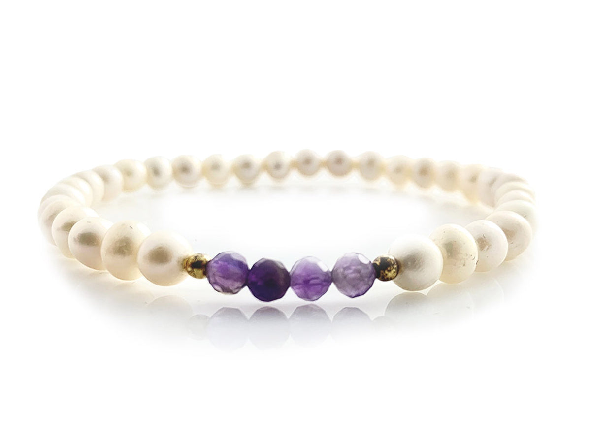 PULSERA DE PERLAS CON CENTRO DE AMATISTA Y PLATA.