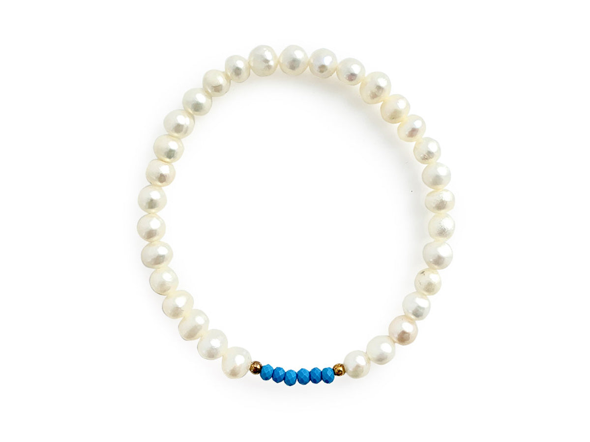 PULSERA DE PERLAS CON CENTRO DE TURQUESA Y PLATA