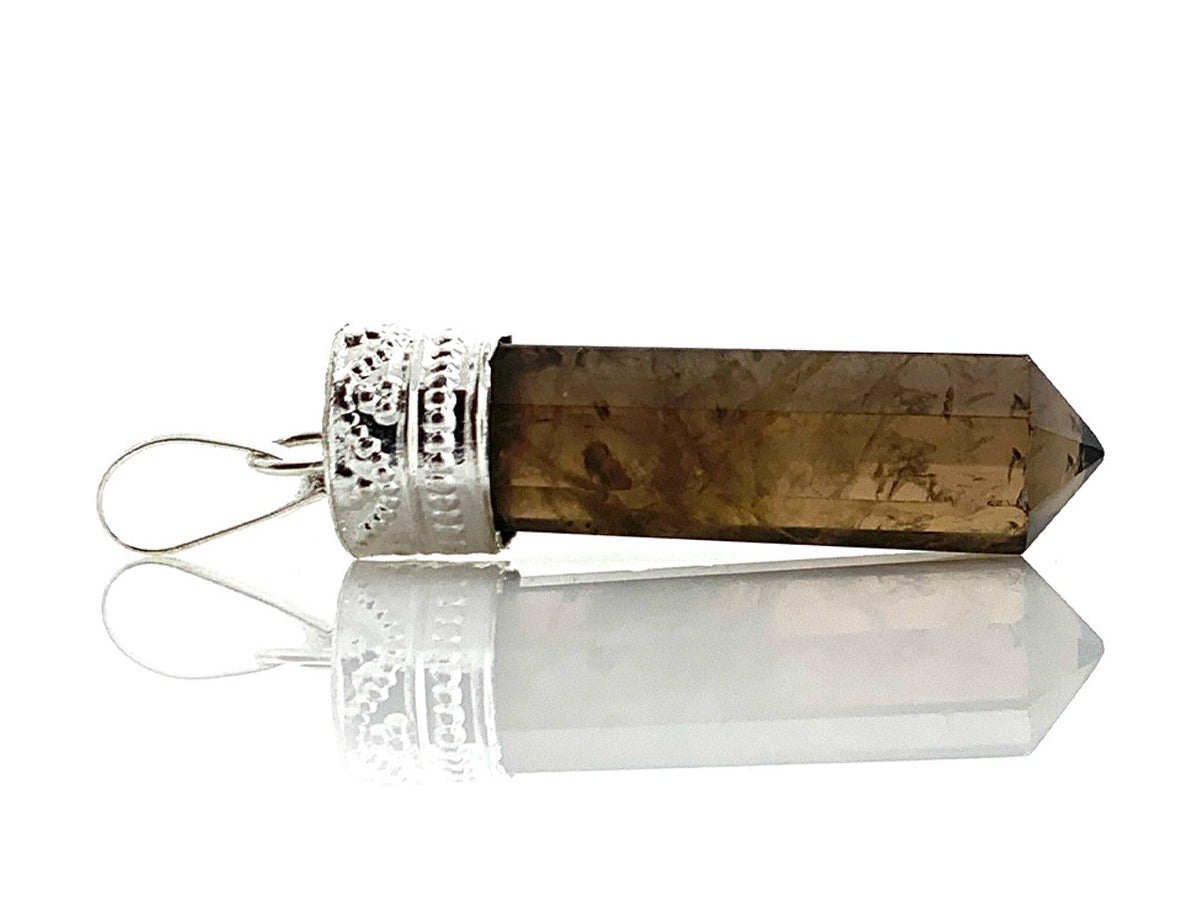 DIJE DE CUARZO AHUMADO 6 CARAS CHICO.