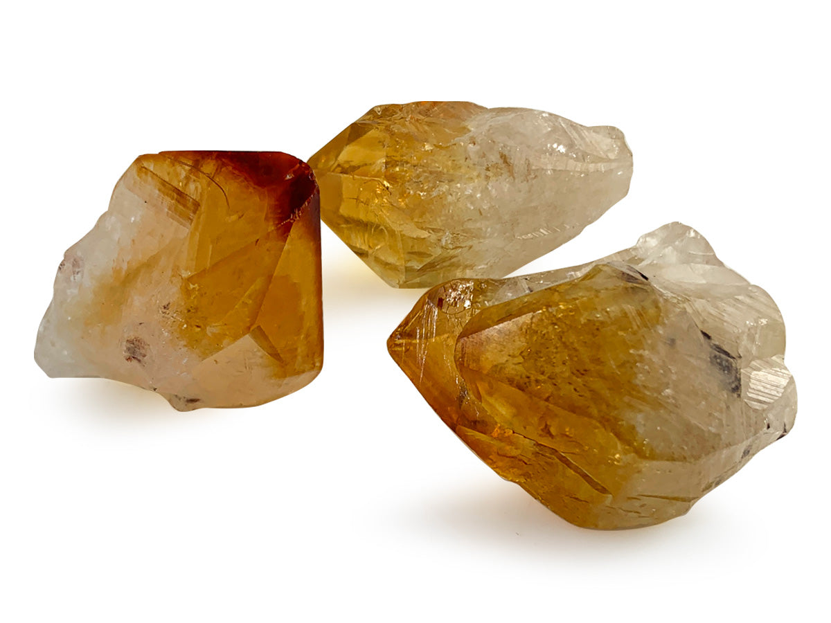 3 PUNTAS DE CUARZO CITRINO MEDIANAS RÚSTICAS.