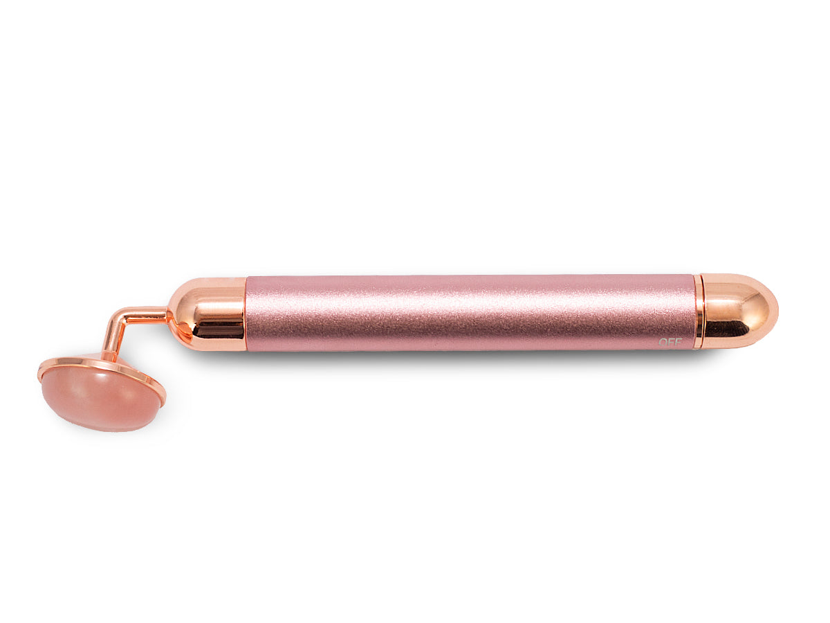 MASAJEADOR FACIAL DE CUARZO ROSA.