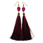 Aretes de Cráneo de Howlita Color Fucsia - vista lateral