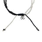 Pulsera Ying-yang Cuarzo Blanco y Espinela - detalle de textura y color