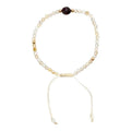 PULSERA CUARZO RUTILADO CENTRO ÁMBAR
