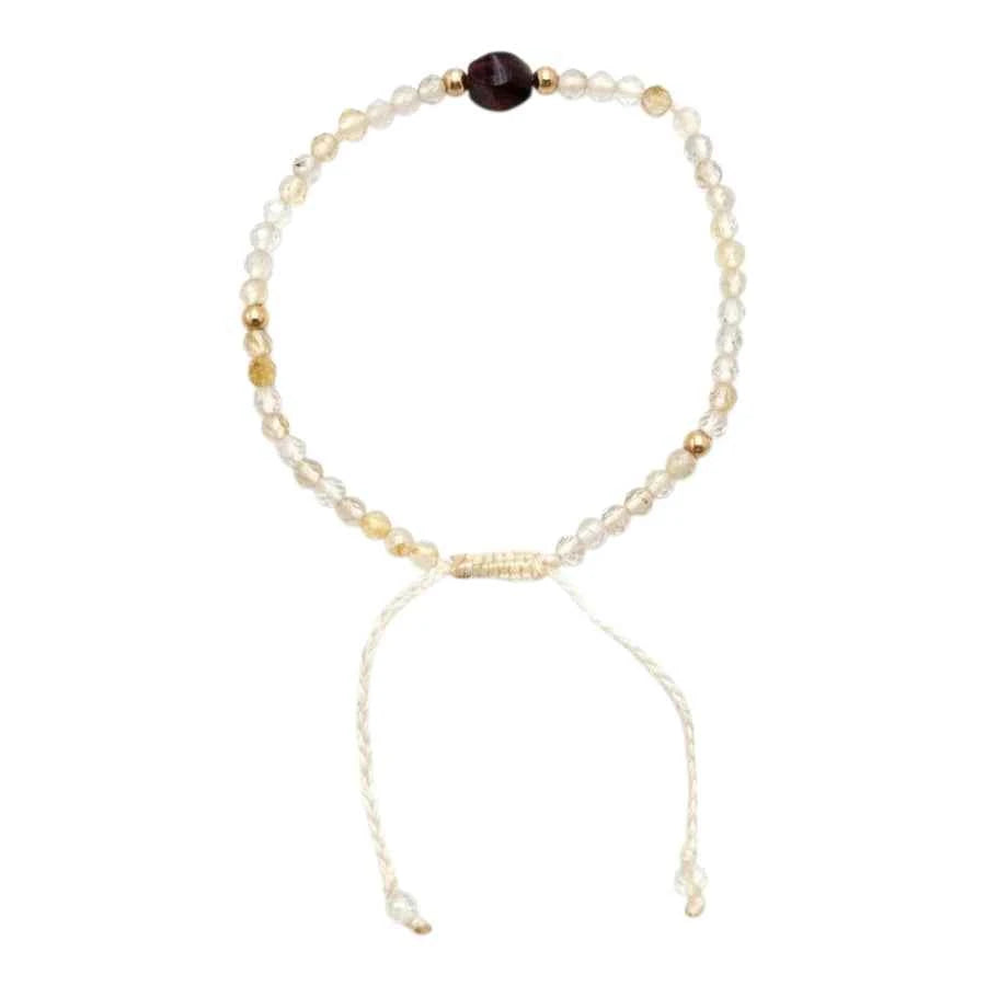 PULSERA CUARZO RUTILADO CENTRO ÁMBAR