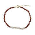 PULSERA DE HESSONITA CON CENTRO DE CUARZO RUTILADO