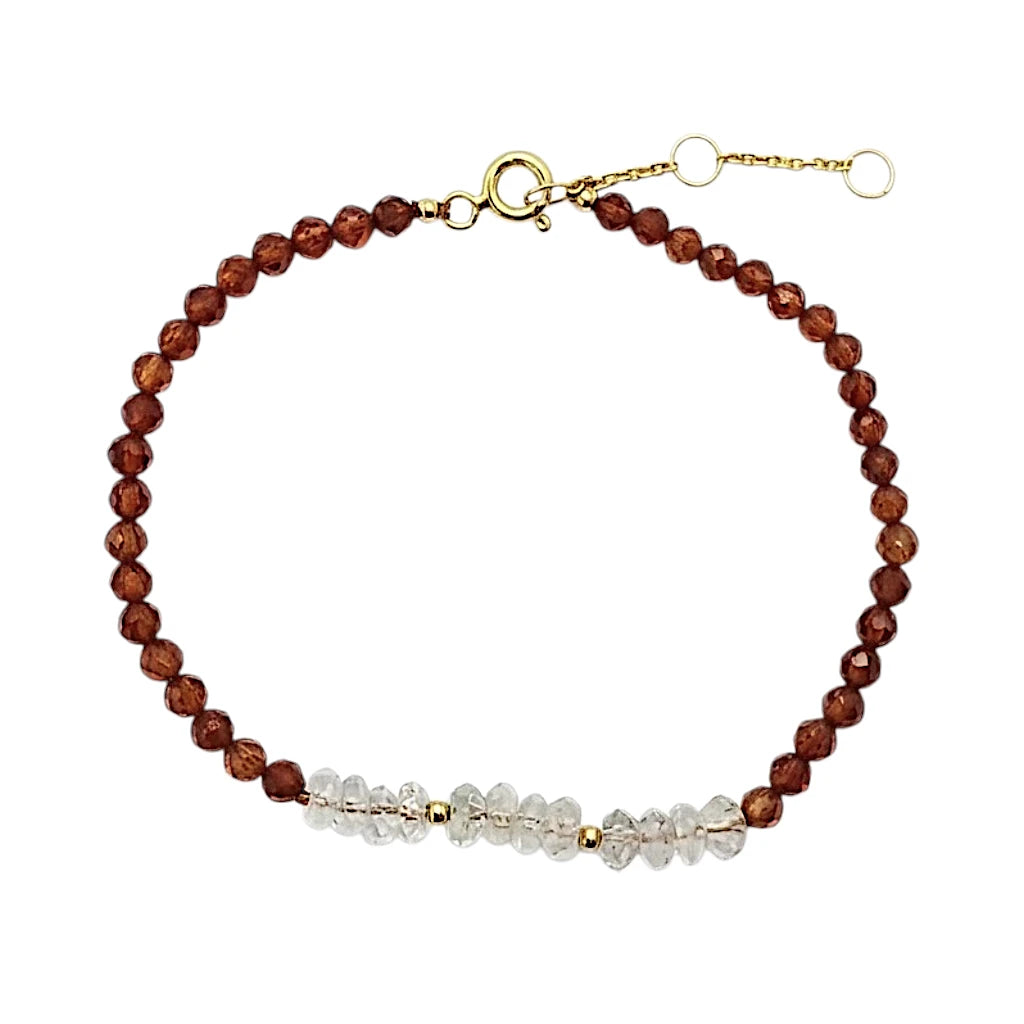 PULSERA DE HESSONITA CON CENTRO DE CUARZO RUTILADO
