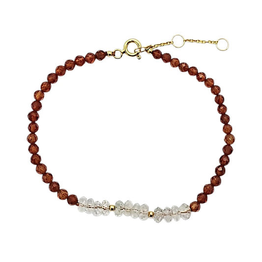 PULSERA DE HESSONITA CON CENTRO DE CUARZO RUTILADO