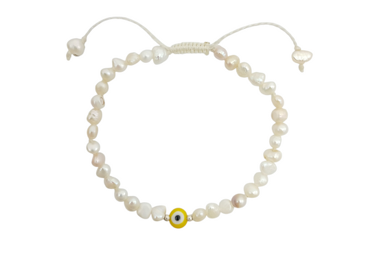 PULSERA DE PERLAS CON CENTRO OJO TURCO