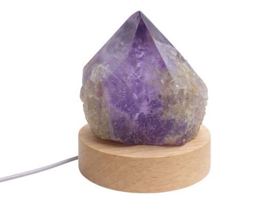 PUNTA DE AMATISTA LAPIDADA ILUMINADA