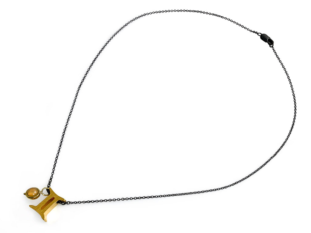 Collar del Zodiaco "géminis" Pavonado con Mineral - vista lateral
