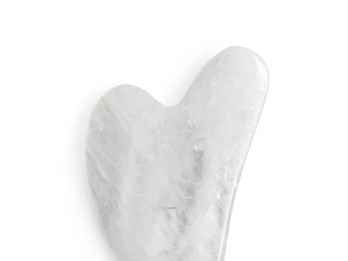 Gua Sha de Cuarzo Blanco - vista lateral