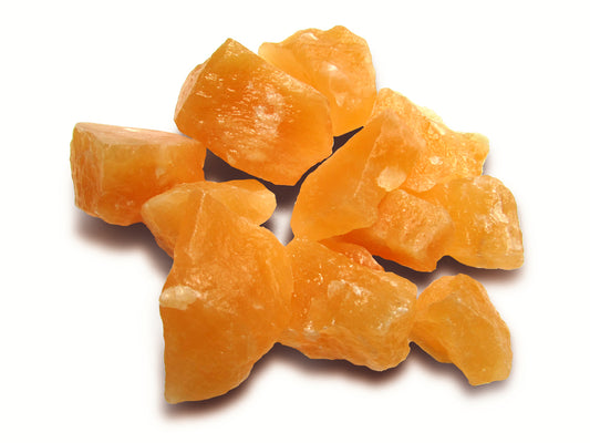 PAQUETE DE 10 PIEZAS DE CALCITA NARANJA TRITURADA.